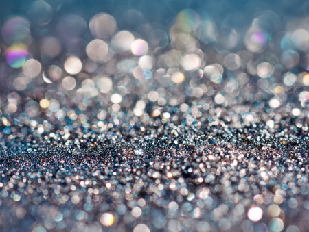 An ethereal surface featuring a gentle, tactile pattern illuminated by glistening highlights, evoking a whimsical, frosty ambiance in serene blue and silvery hues idの写真素材