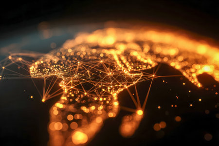 A vibrant display of interconnected digital nodes outlines the African landmass, radiating light against a dark backdrop, illustrating innovation and data flow acrosの写真素材