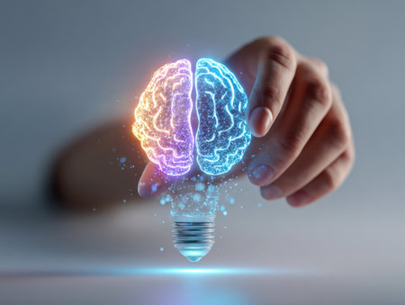 A human hand reaches out to a luminous fusion of a neural network and a light bulb, representing inspired thinking and technological breakthroughs.の写真素材