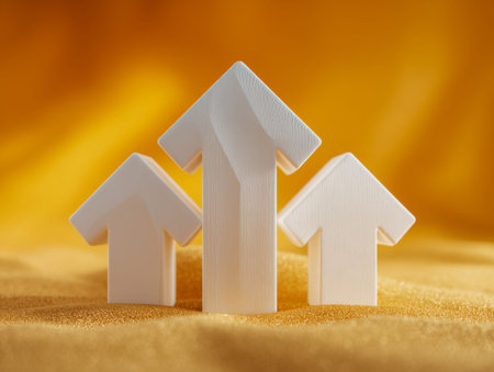 Elegant white arrow icons ascending on a shimmering golden background evoke themes of achievement,...