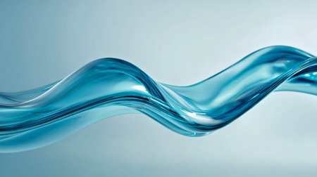An elegant, glossy blue fluid form sweeps across a light background, its flowing curves and reflective surface evoking motion and modern sophistication.の写真素材