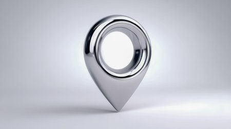 A sleek, polished chrome marker rises on a glossy surface, set against a simple backdrop, embodied guidance and precision in modern digital navigation.の写真素材