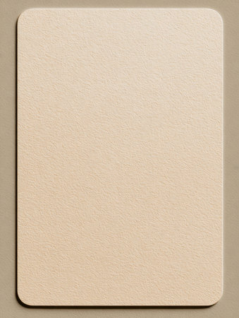 A subtle, earthy-toned card with gentle texture and smooth rounded edges, resting on a matching surface, perfect for elegant minimalist layouts or special invites.の写真素材