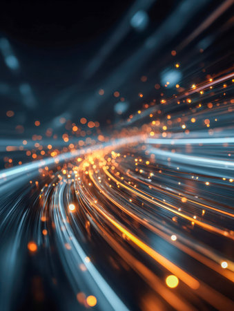 Vibrant blue and orange streaks cut through the darkness, evoking a high-energy sense of rapid movement and cutting-edge technology in a cosmic setting.の写真素材