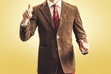 Vintage style Businessman making hand gestures concept symbols, copy space for charts and text の写真素材
