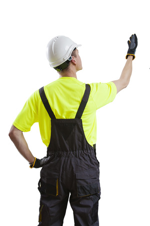 Construction worker presenting end product, isolated on whiteの写真素材