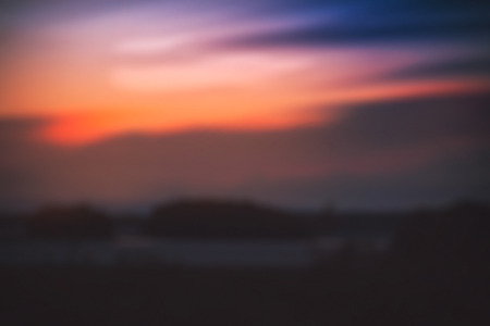 Blurred sunset background abstract darkの写真素材