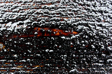Wet tar on wood texture.の写真素材