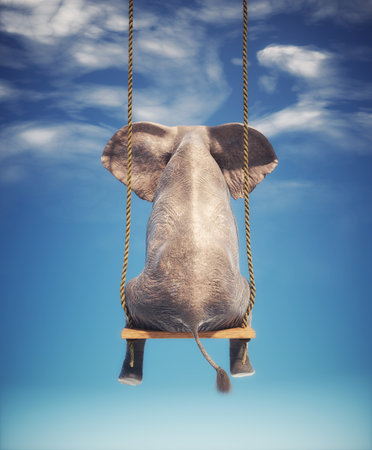 Elephant sitting on a swing. Freedom and happiness concept. This is a 3d render illustrationの写真素材
