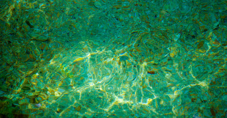 Clean  water texture, with ripples and sun reflections, at summer in Samui. Thailand.