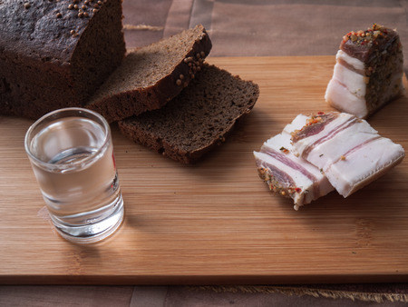 The most delicious still life. Bread, bacon and vodkaの写真素材