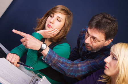 daddy helping daughters with homework