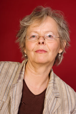 Informal head and shoulders portrait of a relaxed mature woman