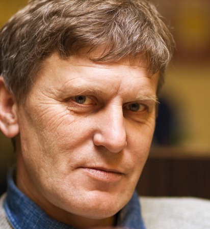 Portrait of a serious mature man; selective focus; の写真素材