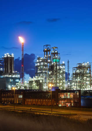 Illuminated petrochemical plant in twilight (Antwerp port, Belgium)の写真素材