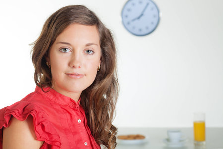 Pretty young woman at home in the morning