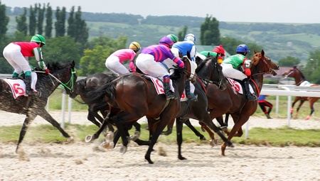PYATIGORSK, RUSSIA - JULY 10: Unidentified riders at the start of a race for the prize of Kazanskogo ippodroma on July 10, 2011, in Pyatigorsk, Caucasus, Russia. のeditorial素材