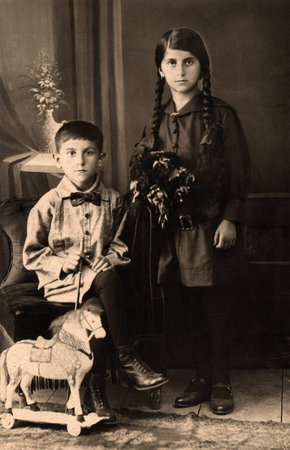 Vintage portrait of two children circa 1915.
