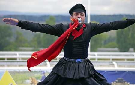 PYATIGORSK,RUSSIA - SEPTEMBER 25,2016:Unknown member of the popular band ''Zolotoe runo'' performs the dance highlanders,hippodrome in Pyatigorsk,Caucasus,Russia on September 25,2016.のeditorial素材