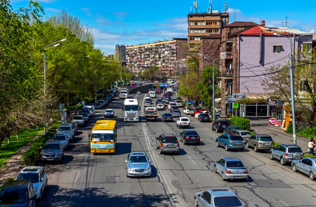 YEREVAN, ARMENIA - APRIL 18,2019: Komitas Street is the main thoroughfare of Yerevan, the capital of...