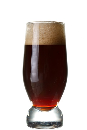 a glass of dark beer の写真素材