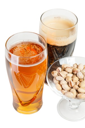 a glass of light and dark beerの写真素材