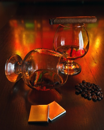 two glasses of brandy with chocolateの写真素材