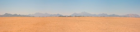 landscape of the desert to the mountainsの写真素材