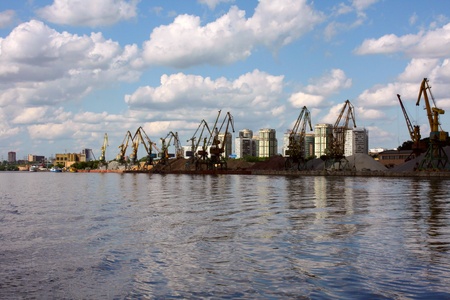cargo cranes at the port on the banksの写真素材