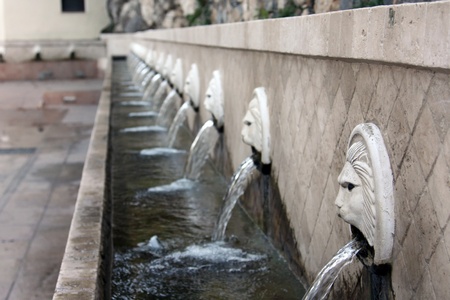 an old fountain in the Spiliの写真素材