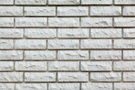 photo of section of brick wall of gray color close-upの写真素材