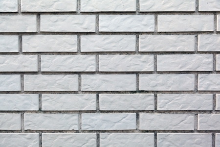 photo of section of brick wall of gray color close-upの写真素材