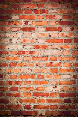 brick wall  red color close-up backgrounds photoの写真素材
