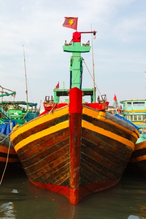 Fishing boats in the bay in Vietnamの写真素材