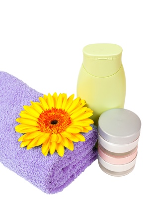 lilac towel, gerbera and chrysanthemum isolated on white backgroundの写真素材