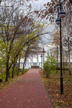 Autumn alley with lanterns and rotunda in the park. Russiaの写真素材