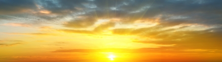 sunrise over the sea and the beach with clear skiesの写真素材