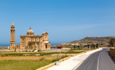 palm leaves and Ta 'Pinu Church in village Gharb, Gozo island, Maltaの写真素材