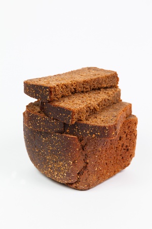 loaf of rye bread on white backgroundの写真素材