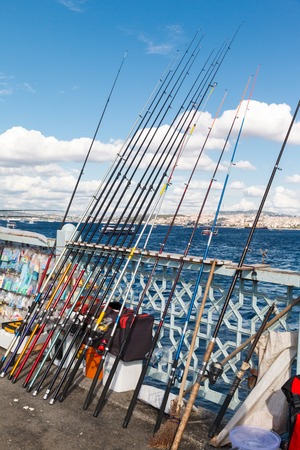rods for travelers on Galata Bridge in the Golden Horn in Istanbulの写真素材
