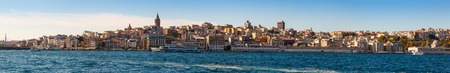 panorama of old districts Istanbul (Karakoy, Galata) from the Bosphorus on a sunny day on background blue skyの写真素材