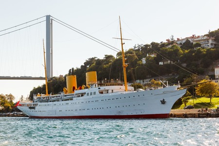 Bosporus and old white steamer on the Bridge and blue skyの写真素材