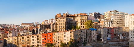 straight row old colored houses in Istanbul on background blue skyの写真素材