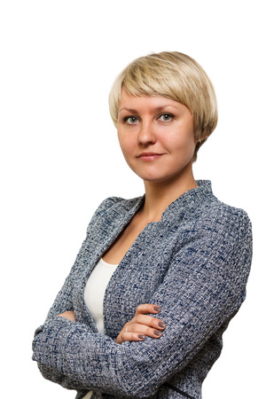 Smiling business woman with blond short hair with folded hands isolated on white background. open smileの写真素材