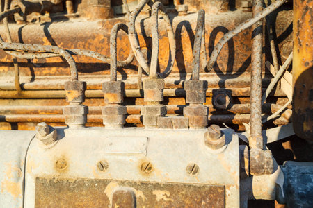 Old rusty vintage diesel engine parts closeup