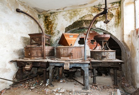 Vintage old abandoned winery, old equipment and grape presses. Sardinia Italyの写真素材