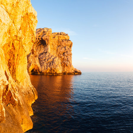 high cliffs and sea, Neptune Grotto in Sardinia, Italy