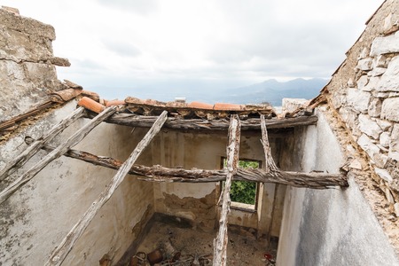 ruins house on background of sky in the mountain town Baunei in Italy, Sardiniaの写真素材