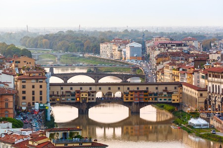 Houses, Arno River and bridges Ponte Vecchio of Florence, Tuscany, Italyの写真素材