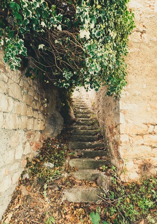the narrow streets of the mountain town of Baunei in Italy, Sardiniaの写真素材